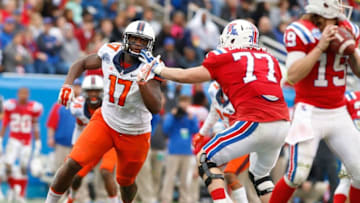 Dec 26, 2014; Dallas, TX, USA; Illinois Fighting Illini defensive lineman Jihad Ward (17) rushes the passer in the game against the Louisiana Tech Bulldogs in the Heart of Dallas Bowl at Cotton Bowl Stadium. Louisiana Tech beat Illinois 35-18. Mandatory Credit: Tim Heitman-USA TODAY Sports
