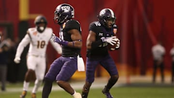 PHOENIX, ARIZONA - DECEMBER 26: Cornerback Jeff Gladney #12 of the TCU Horned Frogs intercepts a pass from the California Golden Bears during the first half of the Cheez-it Bowl at Chase Field on December 26, 2018 in Phoenix, Arizona. (Photo by Christian Petersen/Getty Images)