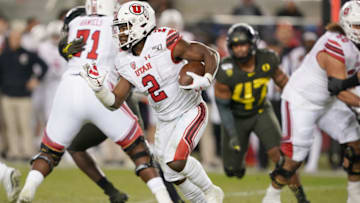 SANTA CLARA, CALIFORNIA - DECEMBER 06: Running back Zack Moss #2 of the Utah Utes carries the ball against the Oregon Ducks during the second half of the Pac-12 Championship Game at Levi's Stadium on December 06, 2019 in Santa Clara, California. (Photo by Thearon W. Henderson/Getty Images)