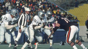 CHICAGO, IL - OCTOBER 1: Otis Sistrunk #60 of the Oakland Raiders in action against Dennis Lick #70 of the Chicago Bears during an NFL Football game October 1, 1978 at Soldier Field in Chicago, Illinois. Sistrunk played for the Raiders from 1972-78. (Photo by Focus on Sport/Getty Images)