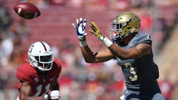 PALO ALTO, CA - SEPTEMBER 15: Keelan Doss #3 of the UC Davis Aggies catches a pass in front of Paulson Adebo #11 of the Stanford Cardinal during the second quarter of an NCAA football game at Stanford Stadium on September 15, 2018 in Palo Alto, California. (Photo by Thearon W. Henderson/Getty Images)