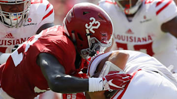 TUSCALOOSA, AL - SEPTEMBER 29: Dylan Moses #32 of the Alabama Crimson Tide assists on a sack on Andre Nunez #7 of the Louisiana Ragin Cajuns at Bryant-Denny Stadium on September 29, 2018 in Tuscaloosa, Alabama. (Photo by Kevin C. Cox/Getty Images)