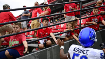 PISCATAWAY, NJ - SEPTEMBER 22: Malcolm Koonce #50 of the Buffalo Bulls high-fives fans after the game against the Rutgers Scarlet Knights at HighPoint.com Stadium on September 22, 2018 in Piscataway, New Jersey. Buffalo won 42-13. (Photo by Corey Perrine/Getty Images)