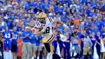GAINESVILLE, FL - OCTOBER 06: Foster Moreau #18 of the LSU Tigers rushes for yardage during the game against the Florida Gators at Ben Hill Griffin Stadium on October 6, 2018 in Gainesville, Florida. (Photo by Sam Greenwood/Getty Images)