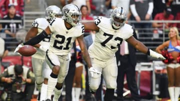 GLENDALE, AZ - NOVEMBER 18: Gareon Conley #21 of the Oakland Raiders celebrates an interception with Maurice Hurst #73 in the first half of the NFL game against the Arizona Cardinals at State Farm Stadium on November 18, 2018 in Glendale, Arizona. (Photo by Jennifer Stewart/Getty Images)