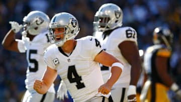 PITTSBURGH, PA - NOVEMBER 08: Derek Carr #4 of the Oakland Raiders celebrates a first quarter touchdown in the first quarter of the game against the Pittsburgh Steelers at Heinz Field on November 8, 2015 in Pittsburgh, Pennsylvania. (Photo by Jared Wickerham/Getty Images)