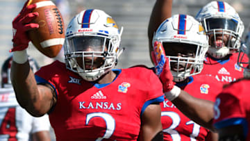 LAWRENCE, KS - OCTOBER 7: Dorance Armstrong Jr. No. 2 of the Kansas Jayhawks celebrates after recovering a fumble against the Texas Tech Red Raiders in the third quarter at Memorial Stadium on October 7, 2017 in Lawrence, Kansas. (Photo by Ed Zurga/Getty Images)