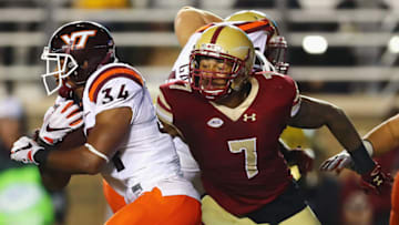 CHESTNUT HILL, MA - OCTOBER 07: Harold Landry No. 7 of the Boston College Eagles attempts to tackle Travon McMillian No. 34 of the Virginia Tech Hokies at Alumni Stadium on October 7, 2017 in Chestnut Hill, Massachusetts. (Photo by Tim Bradbury/Getty Images)