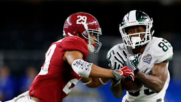 ARLINGTON, TX - DECEMBER 31: Minkah Fitzpatrick No. 29 of the Alabama Crimson Tide attempts to break up a pass intended for Macgarrett Kings Jr. No. 85 of the Michigan State Spartans in the second half during the Goodyear Cotton Bowl at AT&T Stadium on December 31, 2015 in Arlington, Texas. (Photo by Ron Jenkins/Getty Images)