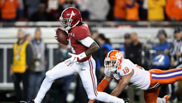 SANTA CLARA, CA - JANUARY 07: Jerry Jeudy #4 of the Alabama Crimson Tide scores a first quarter touchdown reception past Tanner Muse #19 of the Clemson Tigers in the CFP National Championship presented by AT&T at Levi's Stadium on January 7, 2019 in Santa Clara, California. (Photo by Christian Petersen/Getty Images)