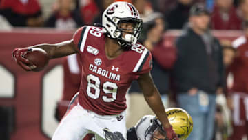 COLUMBIA, SC - NOVEMBER 02: Wide receiver Bryan Edwards #89 of the South Carolina Gamecocks looks to escape a tackle by defensive back Elijah Hamilton #15 of the Vanderbilt Commodores at Williams-Brice Stadium on November 2, 2019 in Columbia, South Carolina. (Photo by Michael Chang/Getty Images)