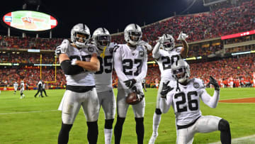 KANSAS CITY, MO - DECEMBER 01:Oakland Raiders players free safety Erik Harris #25, free safety Curtis Riley #35, cornerback Trayvon Mullen #27, cornerback Daryl Worley #20 and cornerback Nevin Lawson #26, pose after a defensive stop against the Kansas City Chiefs, during the second half at Arrowhead Stadium on December 1, 2019 in Kansas City, Missouri. (Photo by Peter G. Aiken/Getty Images)