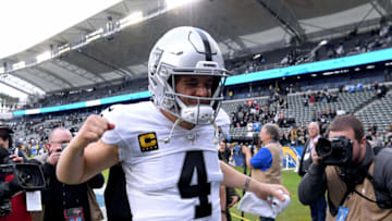 CARSON, CALIFORNIA - DECEMBER 22: Derek Carr #4 of the Oakland Raiders celebrates a 24-17 win over the Los Angeles Chargers as he leaves the field at Dignity Health Sports Park on December 22, 2019 in Carson, California. (Photo by Harry How/Getty Images)