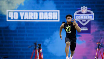 INDIANAPOLIS, IN - FEBRUARY 28: Running back Jonathan Taylor of Wisconsin runs the 40-yard dash during the NFL Combine at Lucas Oil Stadium on February 28, 2020 in Indianapolis, Indiana. (Photo by Joe Robbins/Getty Images)