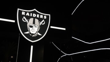 LAS VEGAS, NEVADA - SEPTEMBER 19: A Raiders logo is illuminated at the base of the marquee outside Allegiant Stadium, the USD 2 billion, 65,000-seat home of the Las Vegas Raiders, on September 19, 2020 in Las Vegas, Nevada. The Raiders will play their first game as Las Vegas' NFL franchise at the glass-domed facility against the New Orleans Saints on September 21, coinciding with the 50th anniversary of the league's first "Monday Night Football" broadcast. (Photo by Ethan Miller/Getty Images)