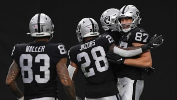 LAS VEGAS, NEVADA - DECEMBER 13: Las Vegas Raiders tight end Foster Moreau #87 celebrates a touchdown with teammates against Indianapolis Colts during the first quarter at Allegiant Stadium on December 13, 2020 in Las Vegas, Nevada. (Photo by Ethan Miller/Getty Images)