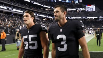 LAS VEGAS, NEVADA - AUGUST 14: Linebacker Tanner Muse #55 and quarterback Nathan Peterman #3 of the Las Vegas Raiders walk off the field after the team's 20-7 victory over the Seattle Seahawks in a preseason game at Allegiant Stadium on August 14, 2021 in Las Vegas, Nevada. (Photo by Ethan Miller/Getty Images)