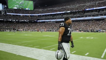 LAS VEGAS, NEVADA - SEPTEMBER 13: Offensive guard Denzelle Good #71 of the Las Vegas Raiders leaves the field after injuring his knee in the first quarter of a game against the Baltimore Ravens at Allegiant Stadium on September 13, 2021 in Las Vegas, Nevada. The Raiders defeated the Ravens 33-27 in overtime. (Photo by Ethan Miller/Getty Images)