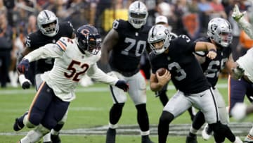 LAS VEGAS, NEVADA - OCTOBER 10: Nathan Peterman #3 of the Las Vegas Raiders runs with the ball as Khalil Mack #52 of the Chicago Bears defends during the second half at Allegiant Stadium on October 10, 2021 in Las Vegas, Nevada. (Photo by Ethan Miller/Getty Images)