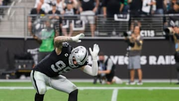 LAS VEGAS, NEVADA - OCTOBER 24: Defensive end Maxx Crosby #98 of the Las Vegas Raiders slams both of his hands on the field after his sack of quarterback Jalen Hurts #1 of the Philadelphia Eagles after a botched snap was wiped out on a delay-of-game penalty against the Eagles during their game at Allegiant Stadium on October 24, 2021 in Las Vegas, Nevada. The Raiders defeated the Eagles 33-22. (Photo by Ethan Miller/Getty Images)
