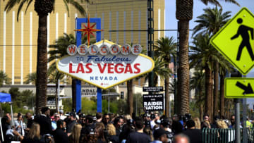 LAS VEGAS, NEVADA - APRIL 25: A sign displays that the lights surrounding the Welcome To Fabulous Las Vegas sign are silver and black for the Las Vegas Raiders during a kick-off event celebrating the 2022 NFL Draft on April 25, 2022 in Las Vegas, Nevada. (Photo by David Becker/Getty Images)