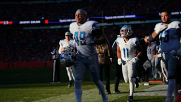 DENVER, COLORADO - DECEMBER 12: Curtis Bolton #49 of the Detroit Lions runs off of the field against the Denver Broncos during an NFL game at Empower Field At Mile High on December 12, 2021 in Denver, Colorado. (Photo by Cooper Neill/Getty Images)
