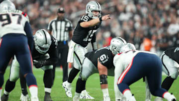 LAS VEGAS, NEVADA - AUGUST 26: Quarterback Chase Garbers #15 of the Las Vegas Raiders signals at the line of scrimmage during the second half of a preseason game against the New England Patriots at Allegiant Stadium on August 26, 2022 in Las Vegas, Nevada. (Photo by Chris Unger/Getty Images)