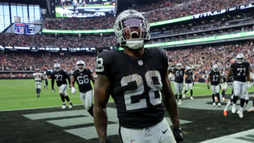 LAS VEGAS, NEVADA - OCTOBER 02: Josh Jacobs #28 of the Las Vegas Raiders celebrates after scoring a touchdown in the fourth quarter against the Denver Broncos at Allegiant Stadium on October 02, 2022 in Las Vegas, Nevada. (Photo by Ethan Miller/Getty Images)