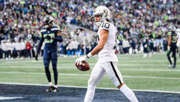 SEATTLE, WASHINGTON - NOVEMBER 27: Mack Hollins #10 of the Las Vegas Raiders celebrates after scoring a touchdown in the second quarter against the Seattle Seahawks at Lumen Field on November 27, 2022 in Seattle, Washington. (Photo by Jane Gershovich/Getty Images)
