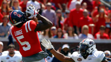 OXFORD, MS - SEPTEMBER 9: Wide receiver DaMarkus Lodge #5 of the Mississippi Rebels catches a pass over safety Tae Martin #3 of the Tennessee Martin Skyhawks for a first down during the second quarter of an NCAA football game at Vaught-Hemingway Stadium on September 9, 2017 in OXFORD, Mississippi. (Photo by Butch Dill/Getty Images)