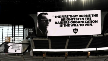 A video board displays an Al Davis quote (Photo by Ethan Miller/Getty Images)