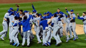 Nov 1, 2015; New York City, NY, USA; Kansas City Royals players celebrate on the field after defeating the New York Mets in game five of the World Series at Citi Field. The Royals win the World Series four games to one. Mandatory Credit: Jeff Curry-USA TODAY Sports