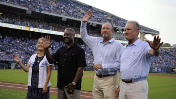 Sep 1, 2015; Kansas City, MO, USA; Kansas City Royals former players (from left to right) Dan Quisenberry, represented by Janine Quisenberry-Stone, Frank White, Brett Saberhagen, and George Brett were honored before the game against the Detroit Tigers at Kauffman Stadium. Detroit won the game 6-5. Mandatory Credit: John Rieger-USA TODAY Sports