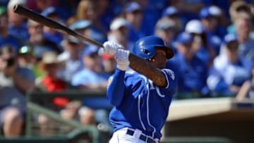 Mar 8, 2016; Surprise, AZ, USA; Kansas City Royals shortstop Raul Mondesi (27) swings the bat against the Colorado Rockies during the third inning at Surprise Stadium. Mandatory Credit: Joe Camporeale-USA TODAY Sports