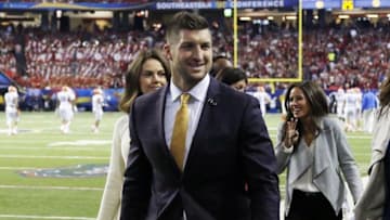 Dec 5, 2015; Atlanta, GA, USA; Florida Gators former quarterback Tim Tebow on the sideline during the game against the Alabama Crimson Tide in the 2015 SEC Championship Game at the Georgia Dome. Mandatory Credit: Brett Davis-USA TODAY Sports