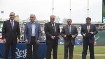 Apr 5, 2016; Kansas City, MO, USA; (left to right) Major League Baseball commissioner Rob Manfred, Kansas City Royals owner David Glass, president David Glass, general manager Dayton Moore, and senior vice president business operations Kevin Uhlich stand on field during the World Series ring presentation prior to the game against the New York Mets at Kauffman Stadium. The Mets won 2-0. Mandatory Credit: Denny Medley-USA TODAY Sports