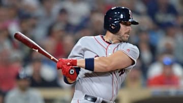 Sep 7, 2016; San Diego, CA, USA; Boston Red Sox third baseman Travis Shaw (47) hits an RBI single during the fourth inning against the San Diego Padres at Petco Park. Mandatory Credit: Jake Roth-USA TODAY Sports