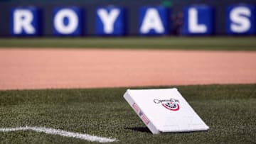 KANSAS CITY, MO - APRIL 13: A detail of an Opening Day logo on a base prior to the start of the Kansas City Royals home opener against the Cleveland Indians on April 13, 2012 at Kauffman Stadium in Kansas City, Missouri. (Photo by Jamie Squire/Getty Images)