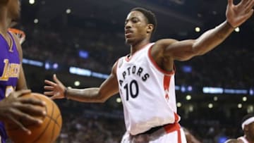 Dec 7, 2015; Toronto, Ontario, CAN; Toronto Raptors guard DeMar DeRozan (10) defends against an inbounds pass by the Los Angeles Lakers at Air Canada Centre. The Raptors beat the Lakers 102-93. Mandatory Credit: Tom Szczerbowski-USA TODAY Sports