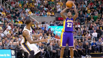 Jan 16, 2016; Salt Lake City, UT, USA; Los Angeles Lakers guard Louis Williams (23) shoots the ball over Utah Jazz forward Chris Johnson (23) during the second half at Vivint Smart Home Arena. The Jazz won 109-82. Mandatory Credit: Russ Isabella-USA TODAY Sports