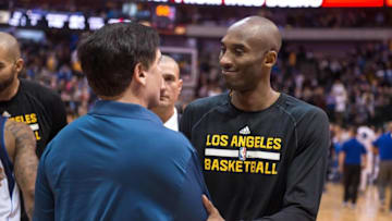 Nov 21, 2014; Dallas, TX, USA; Los Angeles Lakers guard Kobe Bryant (24) greets Dallas Mavericks owner Mark Cuban after game at the American Airlines Center. The Mavericks defeated the Lakers 140-106. Mandatory Credit: Jerome Miron-USA TODAY Sports