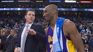 November 24, 2015; Oakland, CA, USA; Golden State Warriors interim head coach Luke Walton (left) talks to Los Angeles Lakers forward Kobe Bryant (24, right) after the game at Oracle Arena. The Warriors defeated the Lakers 111-77. Mandatory Credit: Kyle Terada-USA TODAY Sports