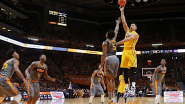 Feb 20, 2016; Knoxville, TN, USA; LSU Tigers forward Ben Simmons (25) shoots the ball as Tennessee Volunteers forward Admiral Schofield (5) defends at Thompson-Boling Arena. Mandatory Credit: Randy Sartin-USA TODAY Sports
