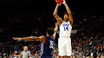 Mar 19, 2016; Providence, RI, USA; Duke Blue Devils guard Brandon Ingram (14) shoots over Yale Bulldogs forward Brandon Sherrod (35) during the second half of a second round game of the 2016 NCAA Tournament at Dunkin Donuts Center. Mandatory Credit: Winslow Townson-USA TODAY Sports