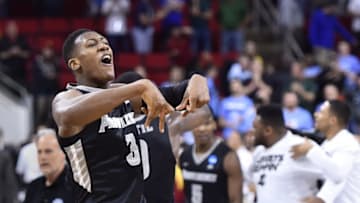 Mar 17, 2016; Raleigh, NC, USA; Providence Friars guard Kris Dunn (3) celebrates on the court after defeating the USC Trojans 70-69 at PNC Arena. Mandatory Credit: Bob Donnan-USA TODAY Sports