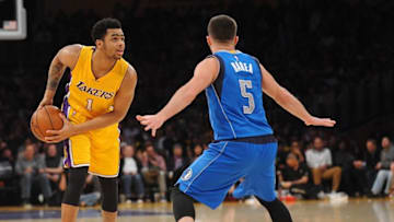 January 26, 2016; Los Angeles, CA, USA; Los Angeles Lakers guard D'Angelo Russell (1) controls the ball against Dallas Mavericks guard J.J. Barea (5) during the second half at Staples Center. Mandatory Credit: Gary A. Vasquez-USA TODAY Sports