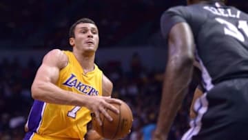 Oct 17, 2015; San Diego, CA, USA; Los Angeles Lakers forward Larry Nance Jr. (7) drives to the basket during the third quarter against Golden State Warriors center Festus Ezeli (31) at Valley View Casino Center. Mandatory Credit: Jake Roth-USA TODAY Sports