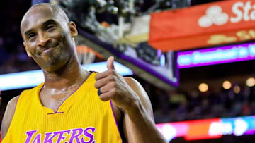 Apr 8, 2016; New Orleans, LA, USA; Los Angeles Lakers forward Kobe Bryant (24) gives a thumbs up following a video presentation of his career during the first quarter of a game against the New Orleans Pelicans at the Smoothie King Center. Mandatory Credit: Derick E. Hingle-USA TODAY Sports