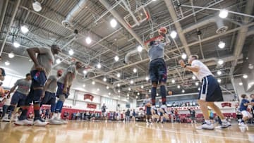 Jul 19, 2016; Las Vegas, NV, USA; USA forward Carmelo Anthony (15) shoots the ball over player development coach Mike Hopkins during a practice at Mendenhall Center. Mandatory Credit: Joshua Dahl-USA TODAY Sports