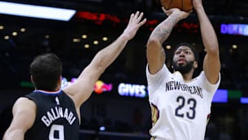 NEW ORLEANS, LA - DECEMBER 03: Anthony Davis #23 of the New Orleans Pelicans shoots over Danilo Gallinari #8 of the LA Clippers during the first half at the Smoothie King Center on December 3, 2018 in New Orleans, Louisiana. NOTE TO USER: User expressly acknowledges and agrees that, by downloading and or using this photograph, User is consenting to the terms and conditions of the Getty Images License Agreement. (Photo by Jonathan Bachman/Getty Images)
